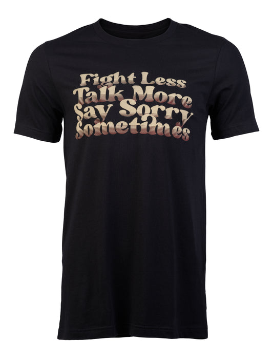 A black t-shirt with light brown text that reads "Fight less, Talk more, Say sorry sometimes"