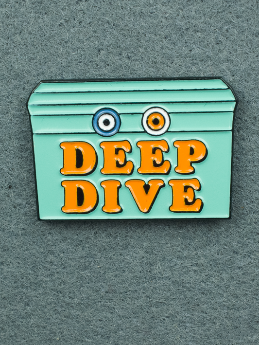 An email pin of a teal treasure chest with orange text reading "deep dive".
